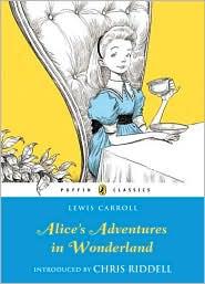Alice in Wonderland book cover showing Alice with playing cards